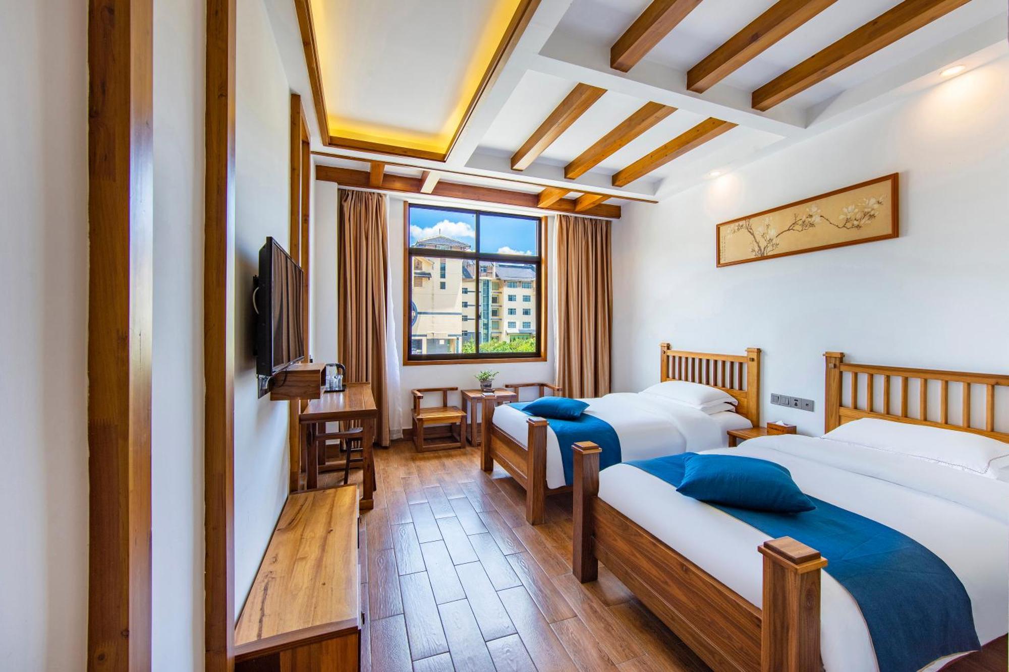 Guihua Road 106Th Hostel Zhangjiajie Buitenkant foto