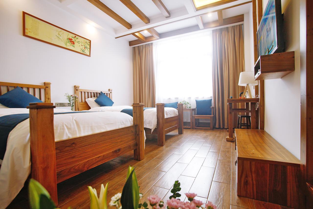 Guihua Road 106Th Hostel Zhangjiajie Buitenkant foto